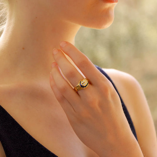 Diamond and sapphire ring set in gold.