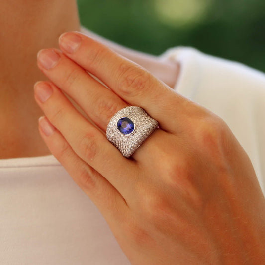 Vintage sapphire and diamond bombe ring in white gold.