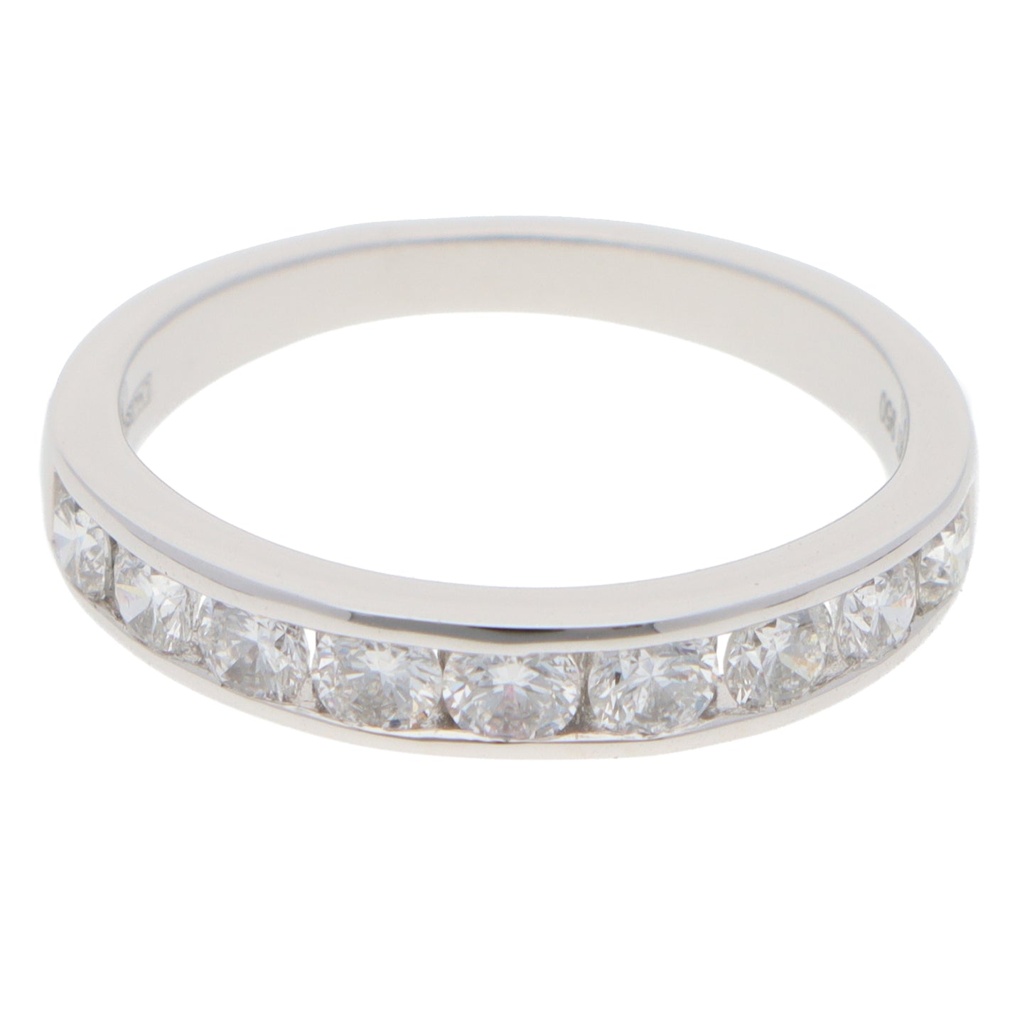 A brilliant cut diamond channel set half eternity band ring, on a white background