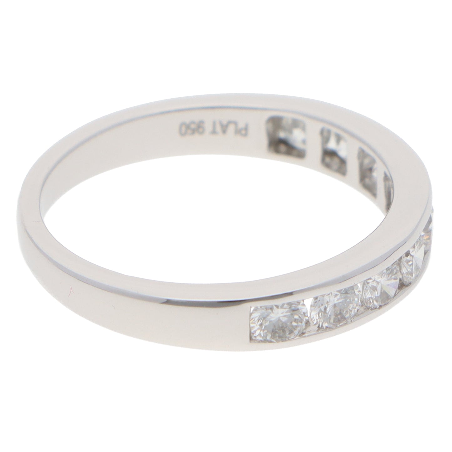 A brilliant cut diamond channel set half eternity band ring, stamped PLAT 950, on a white background