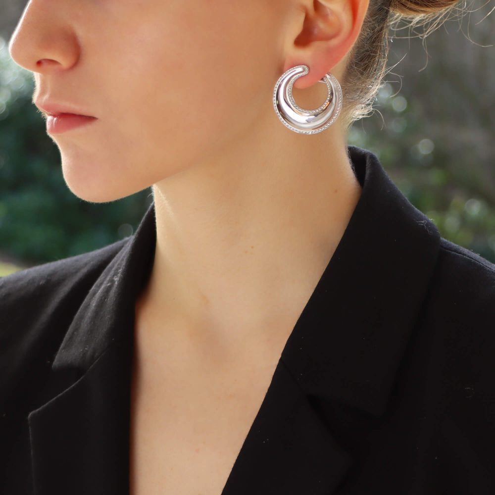 Vintage Chopard diamond chunky hoop earrings set in white gold.