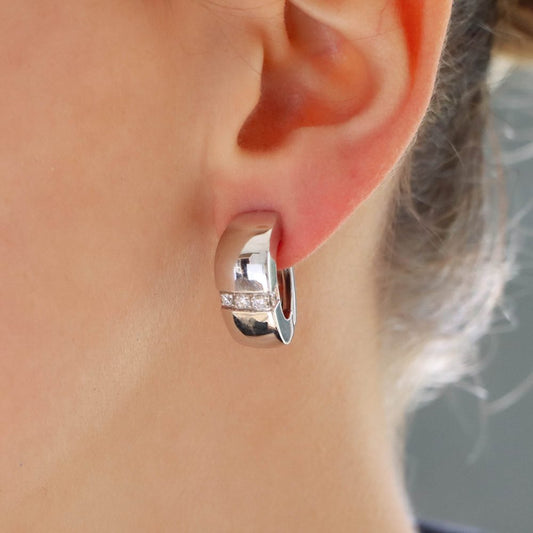 Vintage Mauboussin Paris diamond chunky huggie hoop earrings in white gold.