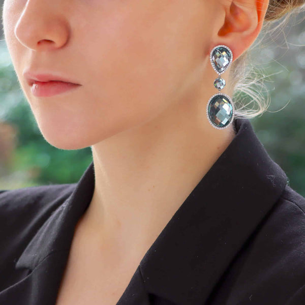 Vintage Roberto Coin blue topaz and diamond drop earrings in white gold.