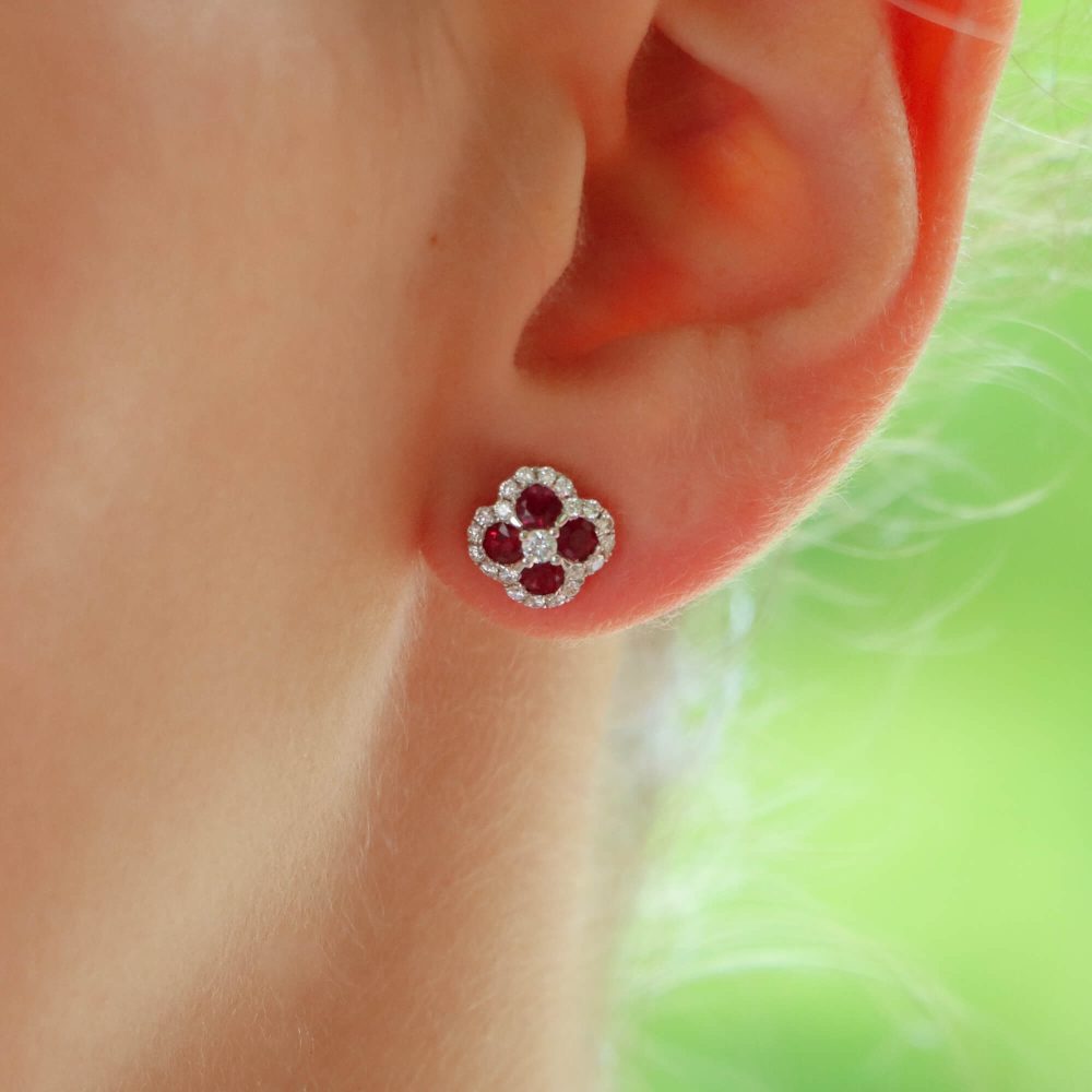 Ruby and diamond cluster earrings in white gold.