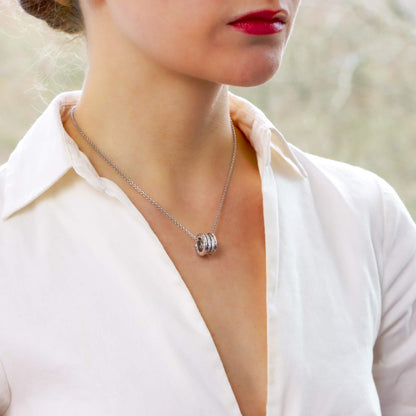 Bulgari diamond pendant necklace set in white gold.