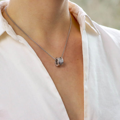 Bulgari diamond pendant necklace set in white gold.