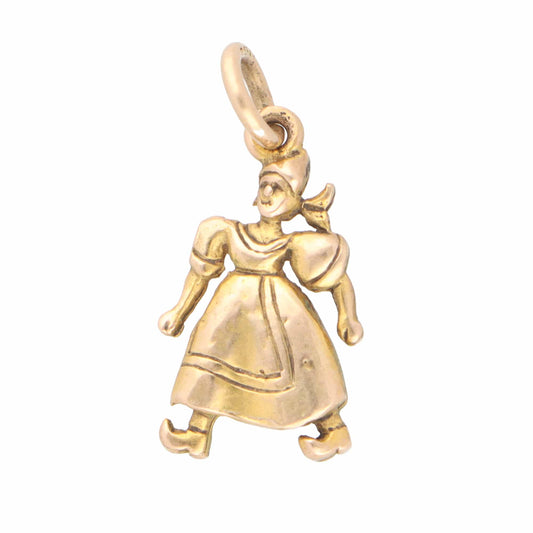 A yellow gold Dutch lady in a dress charm, on a white background