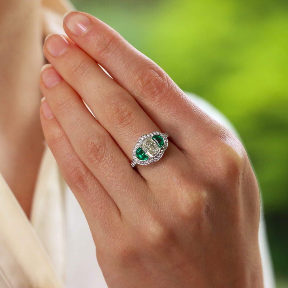 1.6ct Oval Diamond and Emerald Trilogy Halo Cluster Ring in Platinum