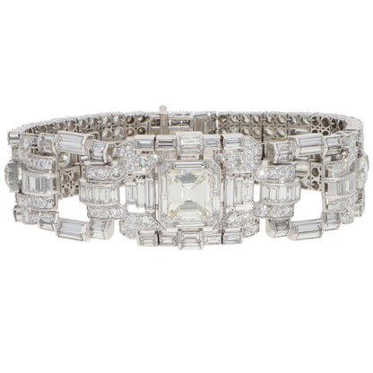 A mixed cut diamond bracelet in platinum, on a white background