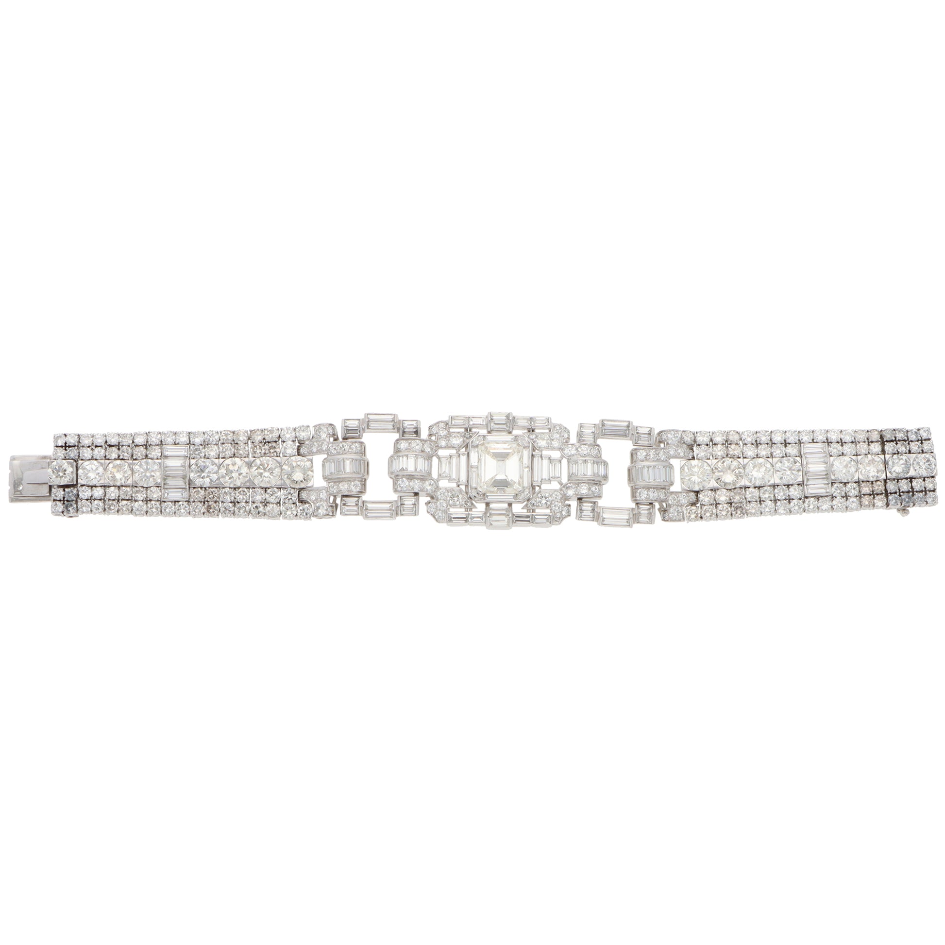 A mixed cut diamond bracelet in platinum, on a white background