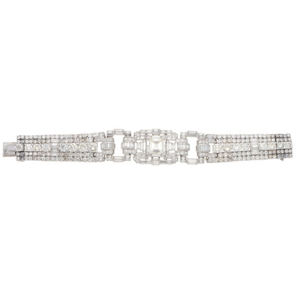 A mixed cut diamond bracelet in platinum, on a white background