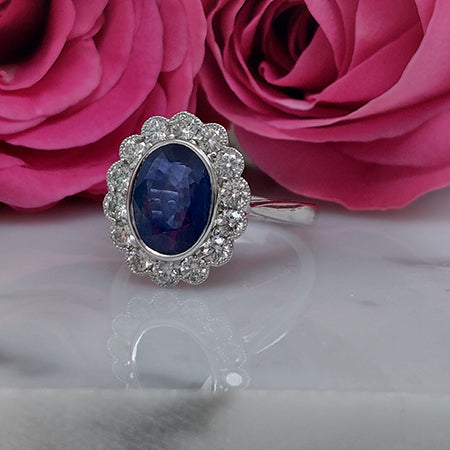2.57ct Sapphire and Diamond Oval Cluster Ring