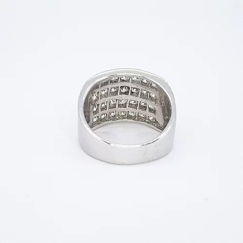 Channel Set Diamond Dress Ring; featuring four horizontal rows channel set with 2.00 carats brilliant cut diamonds, ribbed shoulders, in 18ct white gold