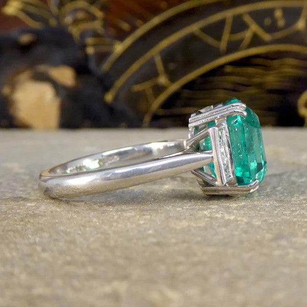 Certified 6.19ct Octagonal Cut Colombian Emerald and Princess Cut Diamond Ring in Platinum with GCS certificate