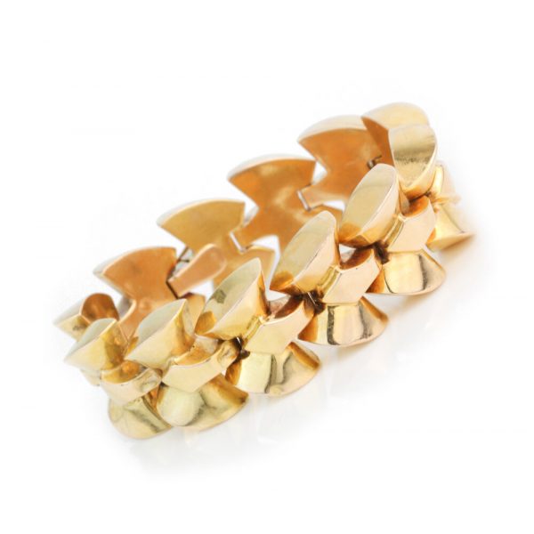 Vintage 1940s French Retro Fancy Link 18ct Yellow Gold Bracelet; comprising fancy links of a geometric bow design, with French owl hallmark for 18ct gold