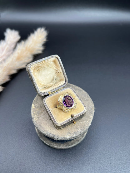 Art Nouveau 18 Carat Yellow and White Gold Oval Amethyst Ring