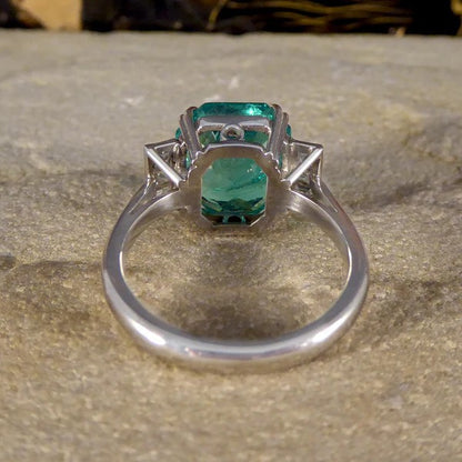 Certified 6.19ct Octagonal Cut Colombian Emerald and Princess Cut Diamond Ring in Platinum with GCS certificate