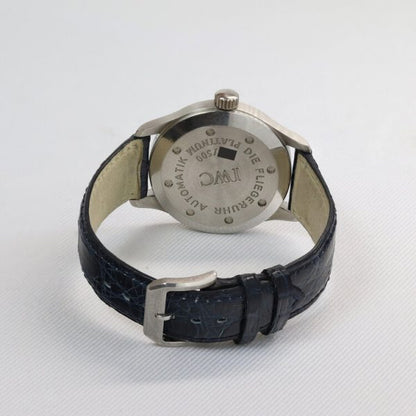 IWC Pilot Aviator Mark II Limited Edition Automatic Watch; 36mm titanium case with blue dial, Arabic numerals and date aperture, on a leather strap with platinum buckle, comes with IWC box. One of 500 examples made in 1993.
