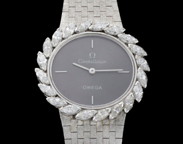 Vintage Omega Ladies 18ct White Gold and Diamond Set Manual Watch; ref 8195, with marquise-cut diamond set bezel, 1.00 carat total, in Omega box, Circa 1980s