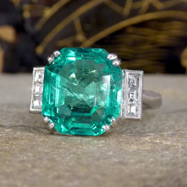 Certified 6.19ct Octagonal Cut Colombian Emerald and Princess Cut Diamond Ring in Platinum with GCS certificate
