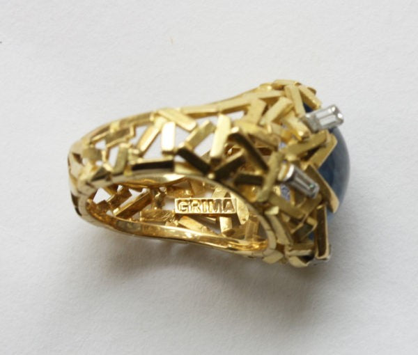 Vintage Cabochon Cut Ceylon Sapphire and Diamond Ring; Sri Lanka sapphire within striking ring composed of 18ct gold sticks, Signed Grima, Circa 1960-70s