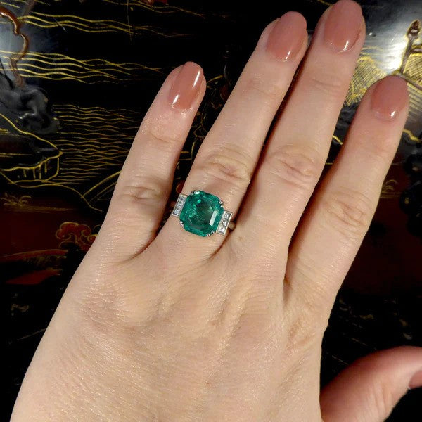 Certified 6.19ct Octagonal Cut Colombian Emerald and Princess Cut Diamond Ring in Platinum with GCS certificate