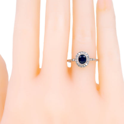 Sapphire 0.65 Carat, Diamond 0.25 Carat and Platinum Halo Cluster Ring