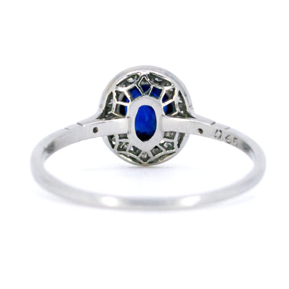 Sapphire 0.65 Carat, Diamond 0.25 Carat and Platinum Halo Cluster Ring
