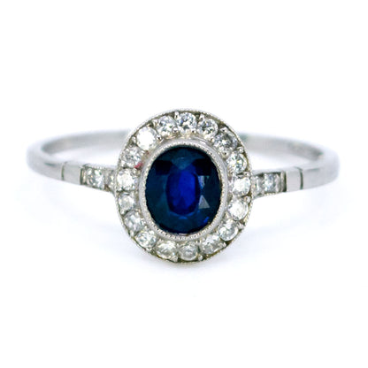 Sapphire 0.65 Carat, Diamond 0.25 Carat and Platinum Halo Cluster Ring