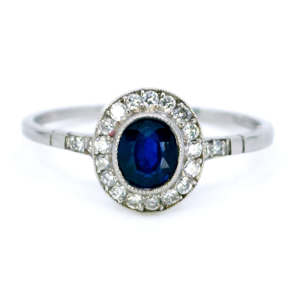 Sapphire 0.65 Carat, Diamond 0.25 Carat and Platinum Halo Cluster Ring