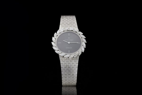 Vintage Omega Ladies 18ct White Gold and Diamond Set Manual Watch; ref 8195, with marquise-cut diamond set bezel, 1.00 carat total, in Omega box, Circa 1980s