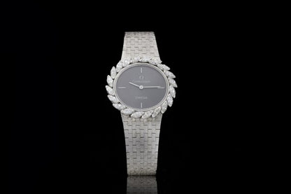 Vintage Omega Ladies 18ct White Gold and Diamond Set Manual Watch; ref 8195, with marquise-cut diamond set bezel, 1.00 carat total, in Omega box, Circa 1980s