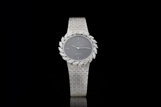 Vintage Omega Ladies 18ct White Gold and Diamond Set Manual Watch; ref 8195, with marquise-cut diamond set bezel, 1.00 carat total, in Omega box, Circa 1980s
