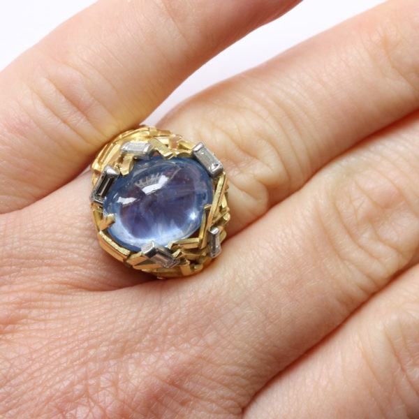 Vintage Cabochon Cut Ceylon Sapphire and Diamond Ring; Sri Lanka sapphire within striking ring composed of 18ct gold sticks, Signed Grima, Circa 1960-70s