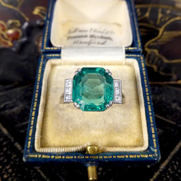Certified 6.19ct Octagonal Cut Colombian Emerald and Princess Cut Diamond Ring in Platinum with GCS certificate