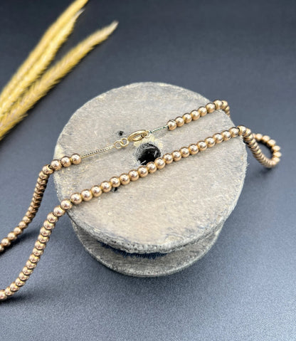 Edwardian 9 Carat Rose Gold Marseille Gold Ball Necklace, Circa 1910