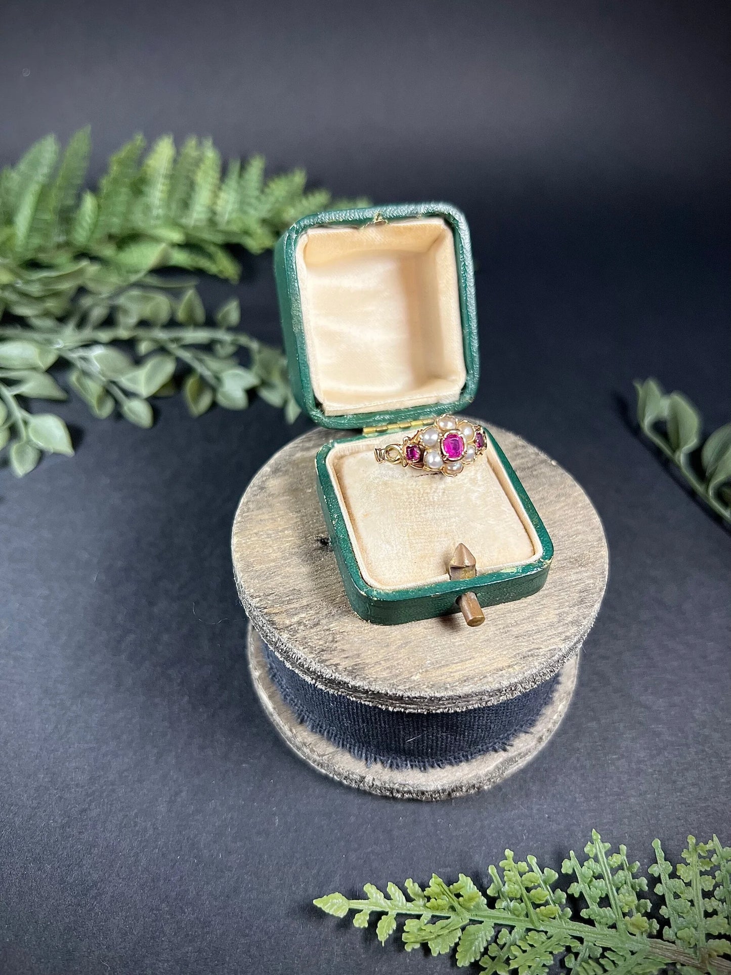 A yellow gold ruby and pearl floral cluster ring, in a ring box