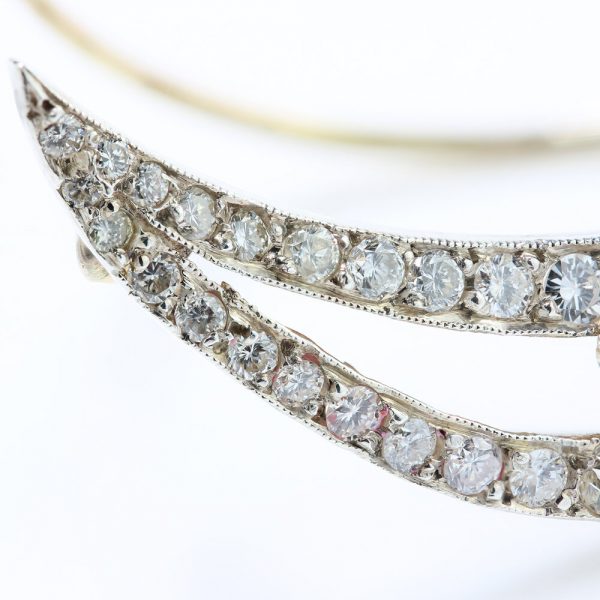 Antique Edwardian Ruby and Old Cut Diamond Cluster Crescent Brooch; oval Burma ruby and old-cut diamond cluster on diamond-set split crescent