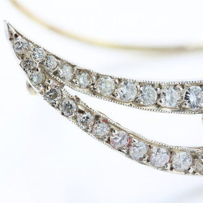 Antique Edwardian Ruby and Old Cut Diamond Cluster Crescent Brooch; oval Burma ruby and old-cut diamond cluster on diamond-set split crescent