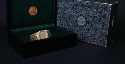 Vintage Rolex Cellini 18ct Yellow Gold 27mm Manual Watch, champagne dial, Roman numerals at 3 6 9 and 12, Rolex 18ct gold bracelet strap, with box, Circa 1990’s