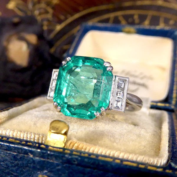 Certified 6.19ct Octagonal Cut Colombian Emerald and Princess Cut Diamond Ring in Platinum with GCS certificate