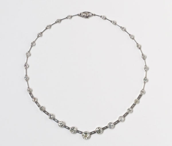 Art Deco Graduated Old Cut Diamond Necklace, 10 carats, thirty-two old-cut diamonds, collet-set with millegrain border, gate-bar links, 18ct white gold.