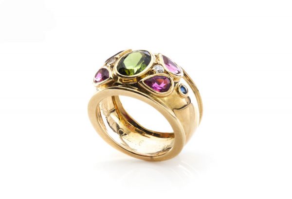 Cartier Multi Gem set 18ct Yellow Gold Ring, set with green tourmaline, pink tourmalines, sapphires and diamonds. Signed, with original box.