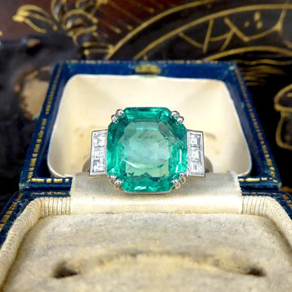 Certified 6.19ct Octagonal Cut Colombian Emerald and Princess Cut Diamond Ring in Platinum with GCS certificate