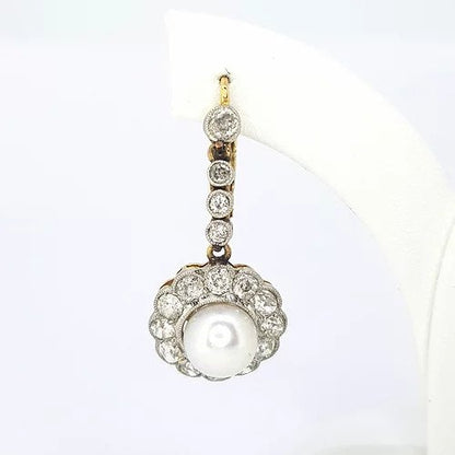 Antique Victorian Pearl and Diamond Cluster Drop Earrings; pearl and diamond clusters suspended from diamond set drops, 2.80 carat total