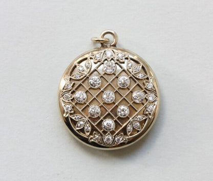 Antique Edwardian Tiffany and Co Diamond Set 20ct Gold Round Locket; diagonal, geometric and floral decoration, mille griffe set old-cut diamonds, Signed