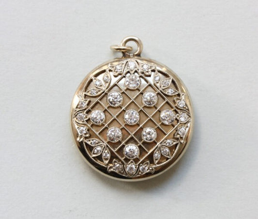 Antique Edwardian Tiffany and Co Diamond Set 20ct Gold Round Locket; diagonal, geometric and floral decoration, mille griffe set old-cut diamonds, Signed