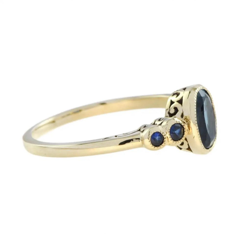 1.15ct Oval Blue Topaz and Sapphire Five Stone Ring