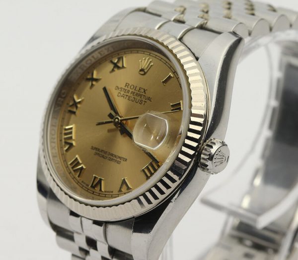 Rolex Datejust 36mm Stainless Steel Automatic Watch with White Gold Bezel and Champagne Dial, ref 116234, on a stainless steel Jubilee bracelet with Crown clasp, Circa 2008-09