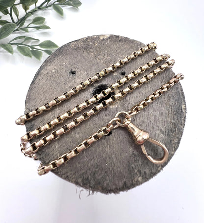 A long rose gold link necklace with swivel clasp